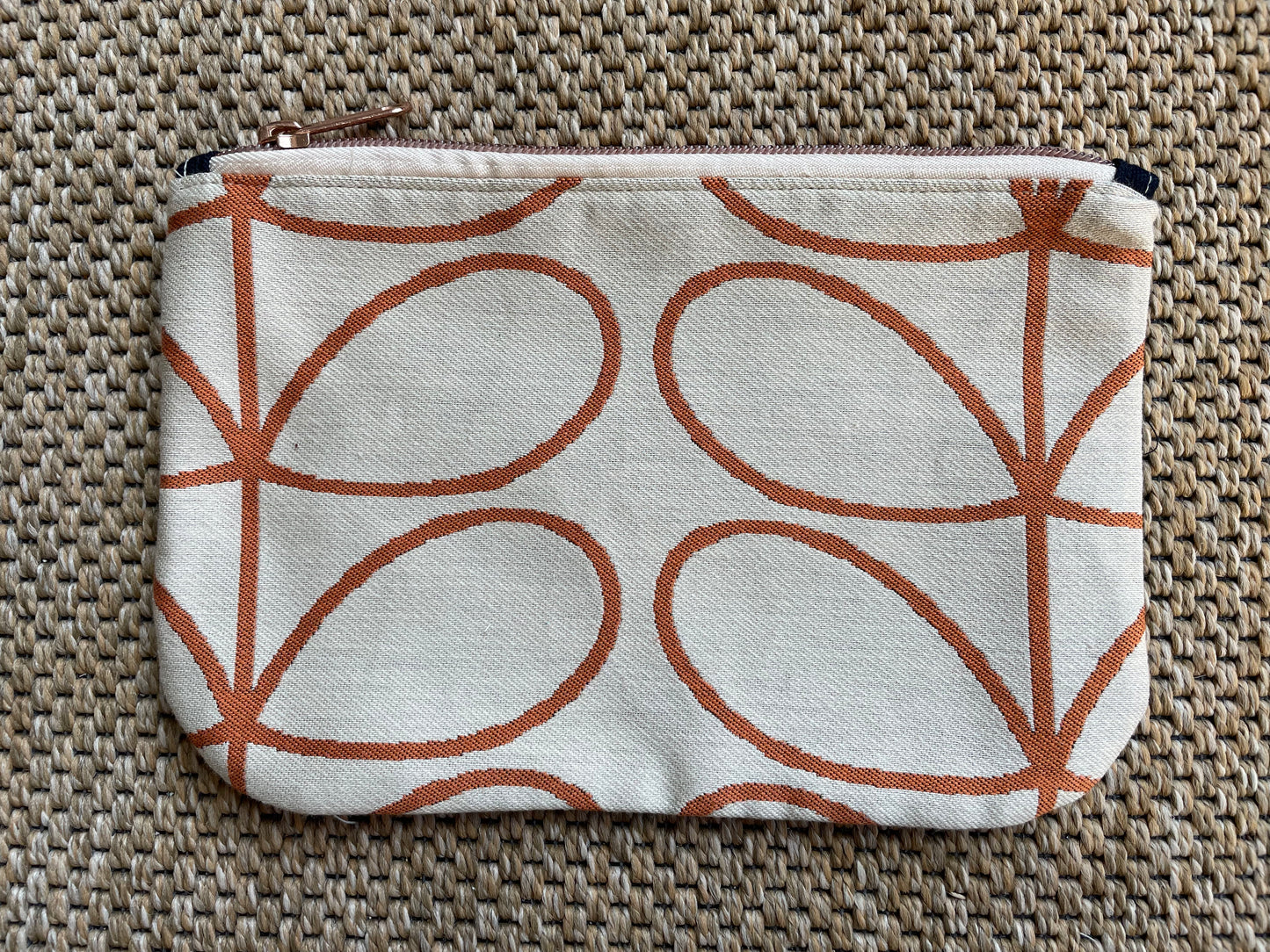 Curved corner zipper pouch.