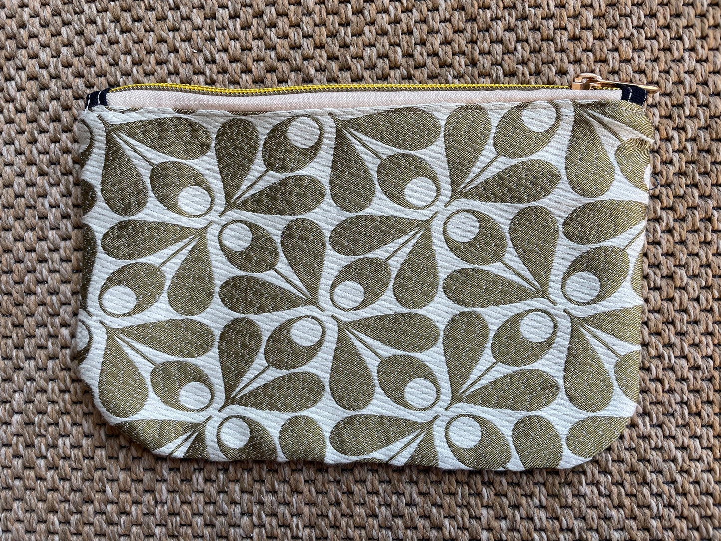 Curved corner zipper pouch.