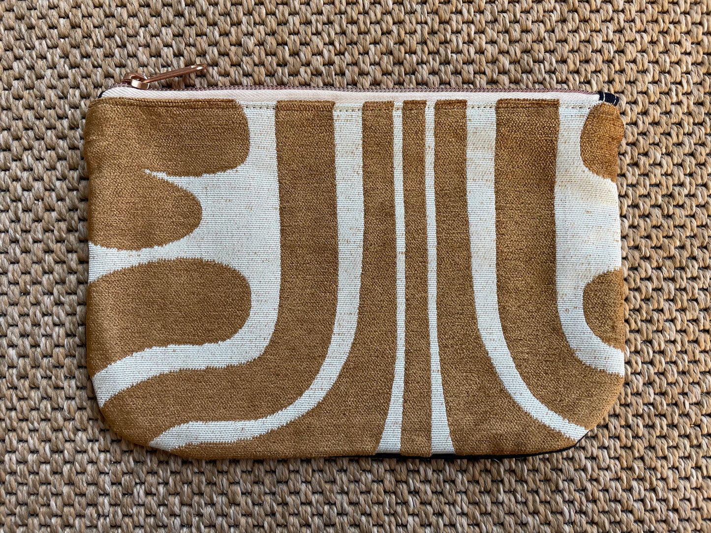 Curved corner zipper pouch.